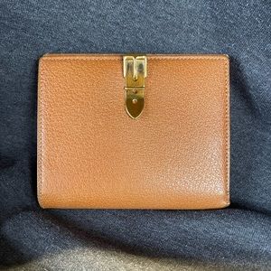 GUCCI snap close wallet. Spacious and in great used condition.